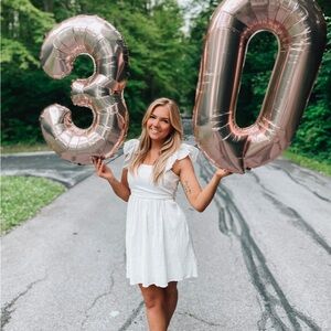 Francesca’s white ruffle sleeve dress